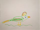 ребенок рисует птичка